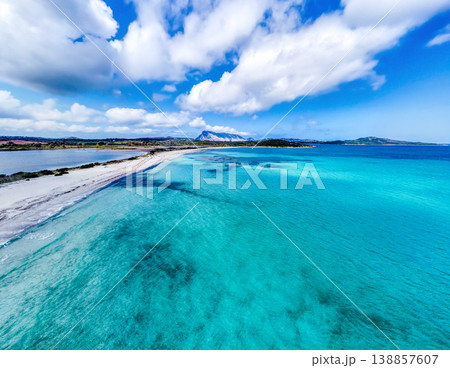 Aerial view of Lu impostu beach under a cloudy sky Aerial view of Lu impostu beach under a cloudy sky 138857607