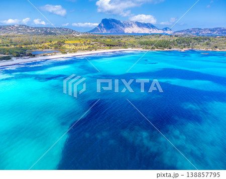 Aerial view of Cala Brandinchi turquoise sea Aerial view of Cala Brandinchi turquoise sea 138857795