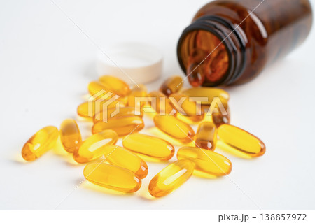 Fish oil or Cod liver oil gel in capsules with omega 3 vitamins, supplementary healthy food. 138857972