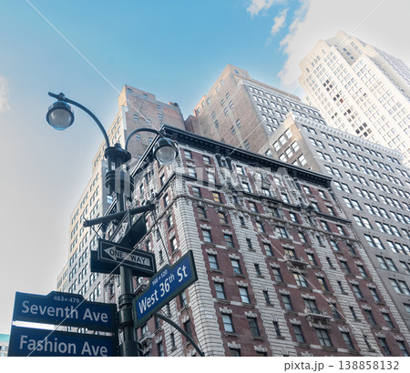 Seventh Ave, Fashion Ave and West 36th Street signs in Manhattan 138858132