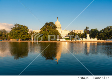 United States Capitol building in National Mall reflected on the pool at sunset 138858177