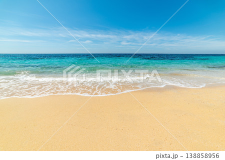 Golden Sand Beach with Turquoise Water under Blue Sky with Cirrus Clouds Golden Sand Beach with Turquoise Water under Blue Sky with Cirrus Clouds 138858956
