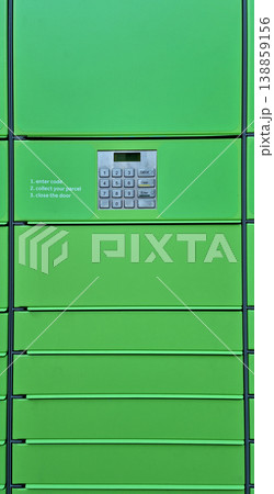 Green automated parcel locker with keypad Green automated parcel locker with keypad 138859156