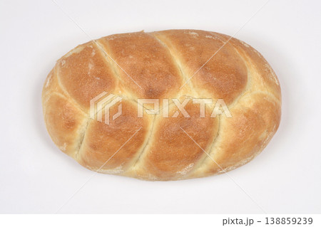 Braided yeast bread roll isolated on white Braided yeast bread roll isolated on white 138859239