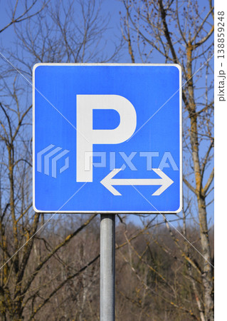 Blue parking traffic sign with arrow Blue parking traffic sign with arrow 138859248