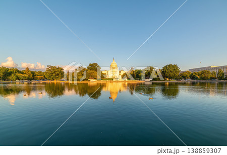 World famous United States Capitol Building reflected on the pool at sunset 138859307