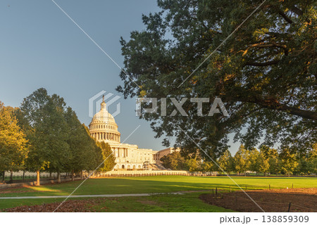 United States Capitol Building under a clear sky at sunset 138859309
