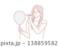 Young woman in casual clothes pierces balloon with needle and looks forward smiling. Vector image 138859582
