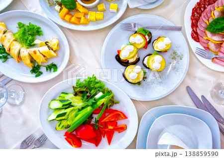 meal at the banquet. good cuts of meat, cheese. the holiday table meal at the banquet. good cuts of meat, cheese. the holiday table 138859590