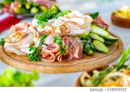 meal at the banquet. good cuts of meat, cheese. the holiday table meal at the banquet. good cuts of meat, cheese. the holiday table 138859597