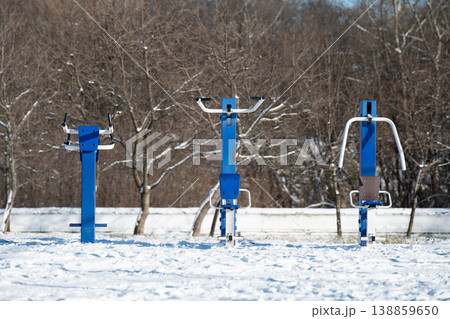 Empty urban fitness area with exercise machines, cold weather . Outdoor sport concept . 138859650