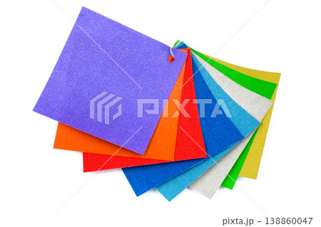 colored samples of fabric on the background. place for text. top view 138860047