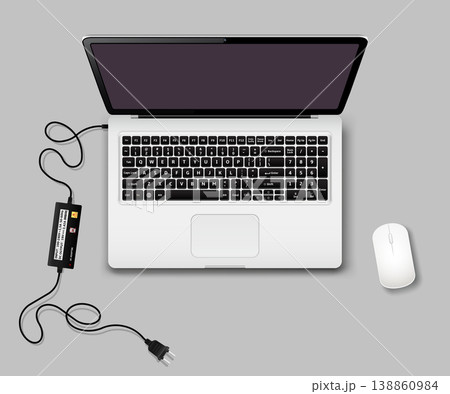 Laptop with computer mouse and charger unplugged Laptop with computer mouse and charger unplugged 138860984