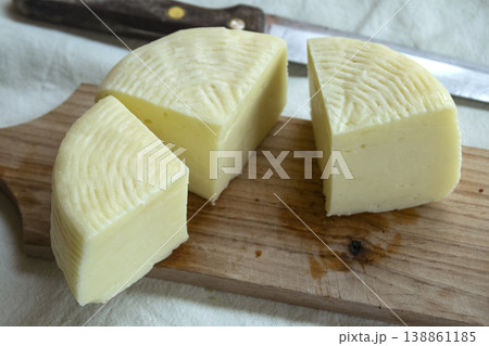 Traditional Italian pecorino cheese on wooden board 138861185