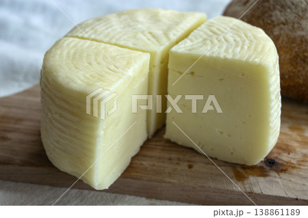 Traditional Italian pecorino cheese on wooden board 138861189