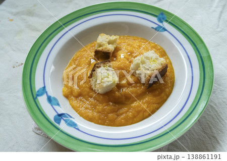 Pumpkin cream soup with crunchy bread croutons Pumpkin cream soup with crunchy bread croutons 138861191