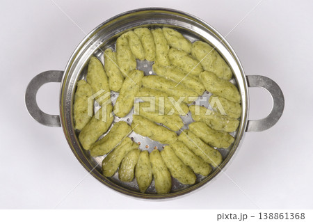 Homemade Green Gnocchi with Arugula in a Steamer Homemade Green Gnocchi with Arugula in a Steamer 138861368