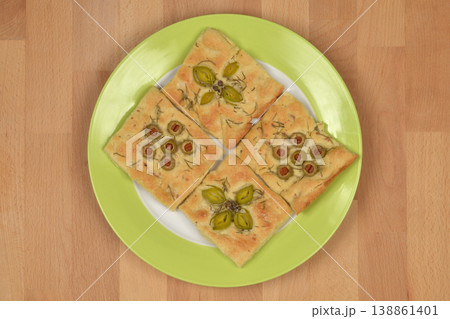 Artistic Focaccia with Leek Capers and Stuffed Olives 138861401