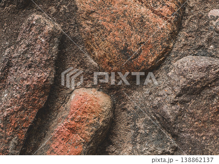 Large stones background old coarse cobblestones texture concrete surface brown solid structure rough, close-up Large stones background old coarse cobblestones texture concrete surface brown solid structure rough, close-up 138862137