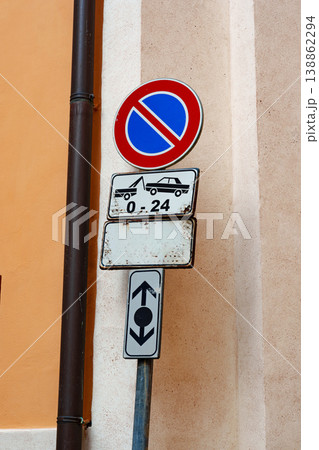 No parking sign on a city street with clear instructions for drivers and pedestrians 138862294