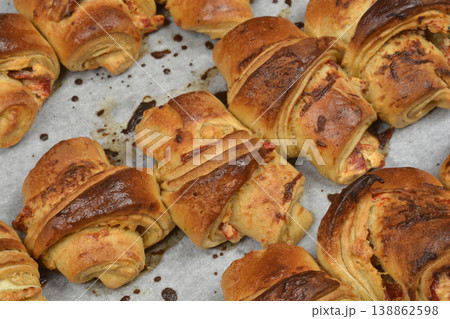 Baked pastry rolls with roasted peppers Baked pastry rolls with roasted peppers 138862598