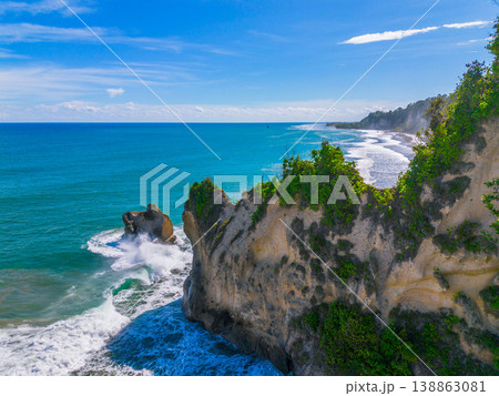 The beautiful aerial view of the morning on the beach with blue sea water in Kaur, Bengkulu, Indonesia The beautiful aerial view of the morning on the beach with blue sea water in Kaur, Bengkulu, Indonesia 138863081