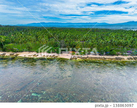 The beautiful aerial view of the morning on the beach with blue sea water in Kaur, Bengkulu, Indonesia The beautiful aerial view of the morning on the beach with blue sea water in Kaur, Bengkulu, Indonesia 138863097