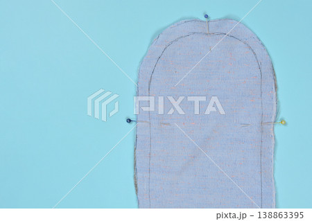 Blue Fabric Sewing Pattern with Pins Blue Fabric Sewing Pattern with Pins 138863395