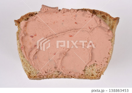Chicken pate spread on a slice of rustic bread Chicken pate spread on a slice of rustic bread 138863453