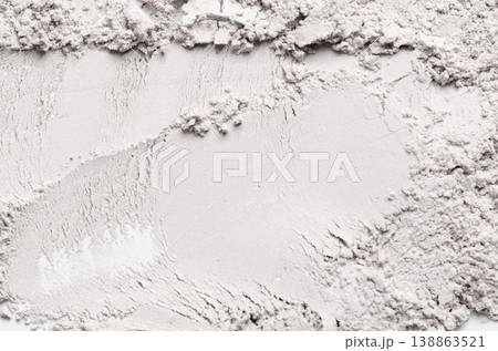 The texture of white cosmetic clay. The concept of cosmetic procedures or mud treatment. The texture of white cosmetic clay. The concept of cosmetic procedures or mud treatment. 138863521
