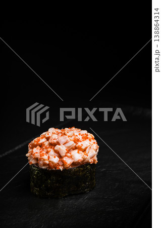 Delicious Fresh Gunkan Sushi Presenting Exquisitely on a Black Background Delicious Fresh Gunkan Sushi Presenting Exquisitely on a Black Background 138864314