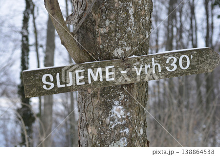 Wooden hiking signpost for Sljeme on Medvednica mountain Wooden hiking signpost for Sljeme on Medvednica mountain 138864538