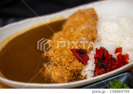Tonkatsu Curry, a plate of rice with fried pork and curry sauce. Japanese food 138864795