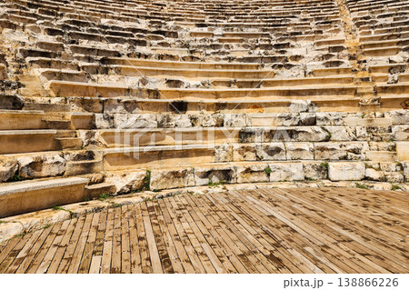 Ancient greek theater ruins showing marble seating 138866226