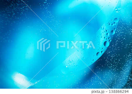 Oil bubbles close up. circles of water macro. abstract light blue background Oil bubbles close up. circles of water macro. abstract light blue background 138866294