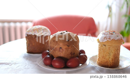 Ukrainian Easter table painted eggs panettone white tablecloth festive food tradition spring holiday 138868646