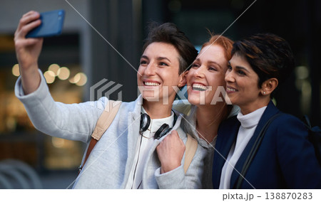 Business people, smile and women take selfie in city for happy memory in town outdoors. Photographer, profile picture and group of friends or coworkers laughing and taking pictures for social media. Business people, smile and women take selfie in city for happy memory in town outdoors. Photographer, profile picture and group of friends or coworkers laughing and taking pictures for social media. 138870283