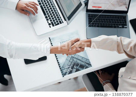 Deal, partnership and handshake with business people in office for contract, B2B and collaboration. Teamwork, welcome and thank you with employee shaking hands for negotiation, meeting and hiring Deal, partnership and handshake with business people in office for contract, B2B and collaboration. Teamwork, welcome and thank you with employee shaking hands for negotiation, meeting and hiring 138870377