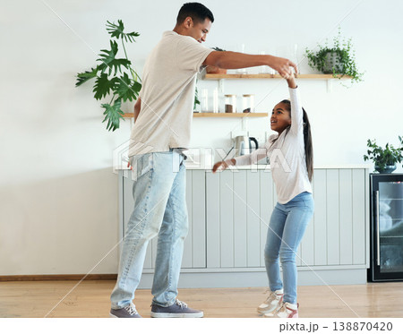 Dance, playful and father and daughter bonding, teaching a move and enjoying quality time. Love, help and dad dancing with a girl daughter, playing and being crazy with happiness in the kitchen Dance, playful and father and daughter bonding, teaching a move and enjoying quality time. Love, help and dad dancing with a girl daughter, playing and being crazy with happiness in the kitchen 138870420