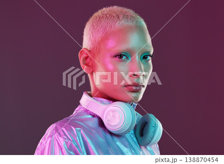 Vaporwave fashion, chroma clothing and portrait of black woman with headphones in studio. Futuristic style, gen z and cosmetics of a young person isolated with cyber and technology aesthetic Vaporwave fashion, chroma clothing and portrait of black woman with headphones in studio. Futuristic style, gen z and cosmetics of a young person isolated with cyber and technology aesthetic 138870454
