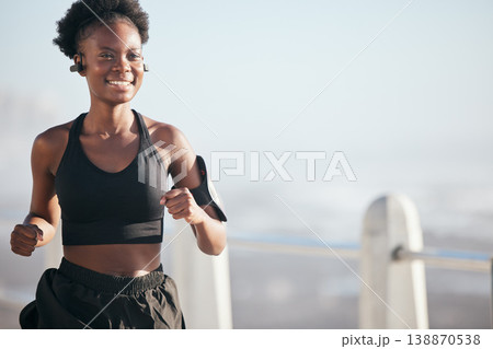 Smile, running and black woman outdoor with music earphones for radio, podcast and mockup space. Sports, fitness and happy African athlete training, workout or exercise for health, wellness or cardio Smile, running and black woman outdoor with music earphones for radio, podcast and mockup space. Sports, fitness and happy African athlete training, workout or exercise for health, wellness or cardio 138870538
