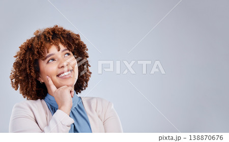 Thinking, space and smile with face of woman in studio for idea, promotion and mockup. Happy, information and announcement with female person on grey background for banner, news and advertising Thinking, space and smile with face of woman in studio for idea, promotion and mockup. Happy, information and announcement with female person on grey background for banner, news and advertising 138870676