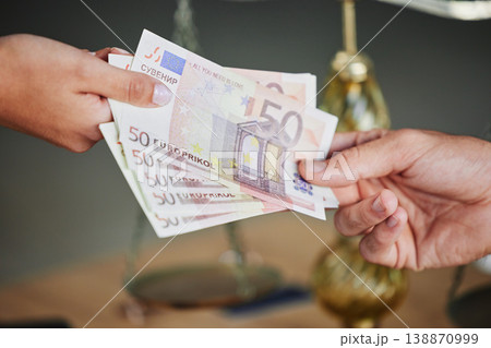 Money, hands and business people with a bribe for justice, legal work and payment for consultation. Deal, meeting and closeup of a person giving cash to a lawyer for a crime, scam or corruption offer Money, hands and business people with a bribe for justice, legal work and payment for consultation. Deal, meeting and closeup of a person giving cash to a lawyer for a crime, scam or corruption offer 138870999