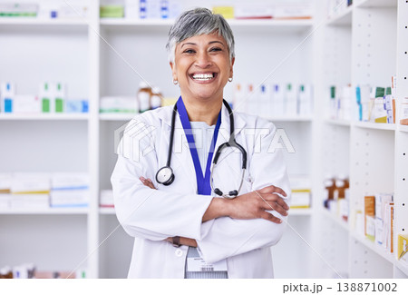Senior woman, pharmacist with arms crossed or portrait of doctor in pharmacy, pharmaceutical store or shop for healthcare. Medicine, consultation on health and confident in medical advice on pills 138871002
