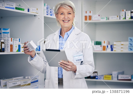Senior woman, pharmacist stock and tablet portrait with medical work and digital research. Pharmacy, healthcare order and pills with elderly female employee with a smile with telehealth information 138871196