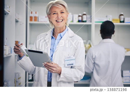 Senior woman, pharmacist and portrait with tablet to check medicine stock in pharmacy. Medical professional, inventory and face of happy doctor with technology, pills or supplements for healthcare. Senior woman, pharmacist and portrait with tablet to check medicine stock in pharmacy. Medical professional, inventory and face of happy doctor with technology, pills or supplements for healthcare. 138871198