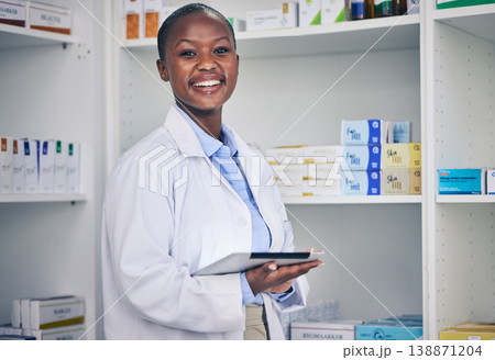 Portrait of black woman, tablet and pharmacist with checklist for stock of medicine, information and advice. Digital list, pharmacy and medical professional with smile, online inventory and helping. 138871204