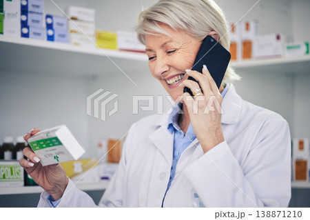 Happy woman, pharmacist and phone call with medication for telehealth, communication or advice at pharmacy. Female person, medical or healthcare expert talking on smartphone for online consultation 138871210