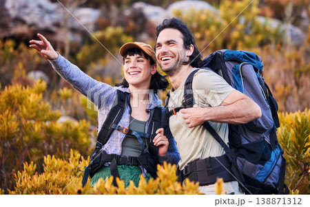 Hiking, travel and couple pointing on mountain for adventure, holiday and sightseeing journey in nature. Happy, dating and excited man and woman walking to explore, trekking and backpacking outdoors 138871312