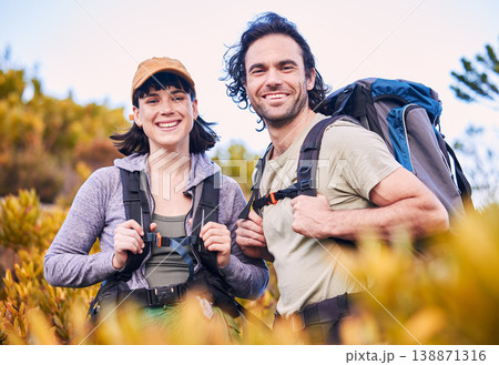 Hiking, fitness and portrait of couple in nature for adventure, holiday and journey on mountain. Travel, dating and happy man and woman walking to explore, trekking and backpack outdoors for wellness 138871316